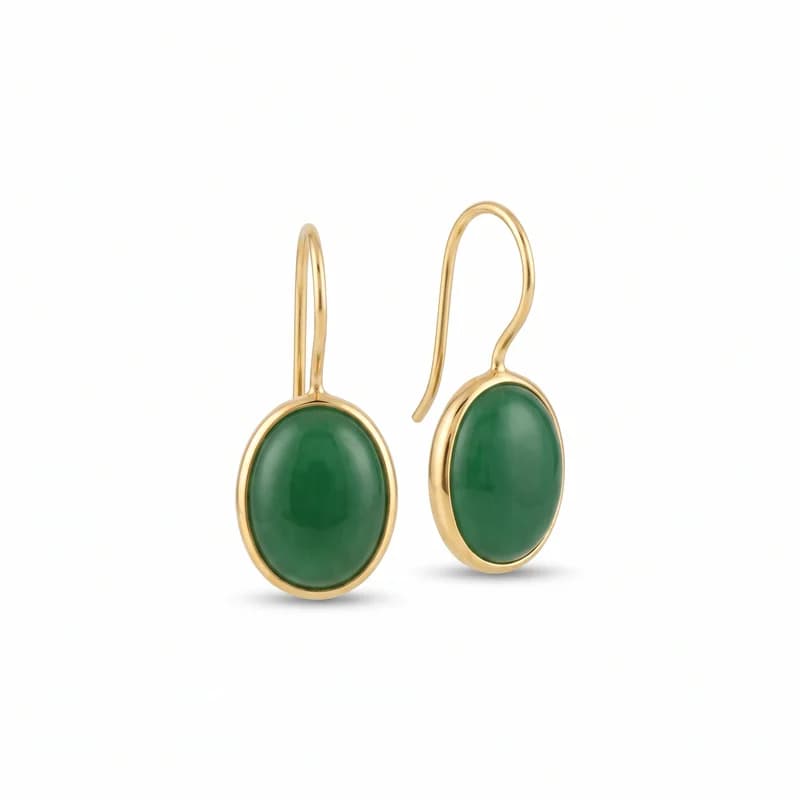 Gold drop earrings with green cabochon stones