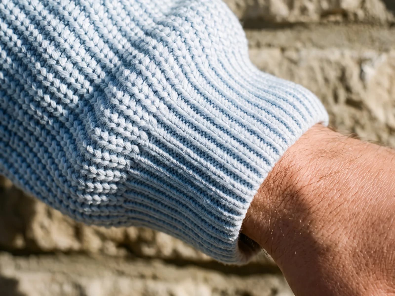 The cuff, where the rib changes gauge.